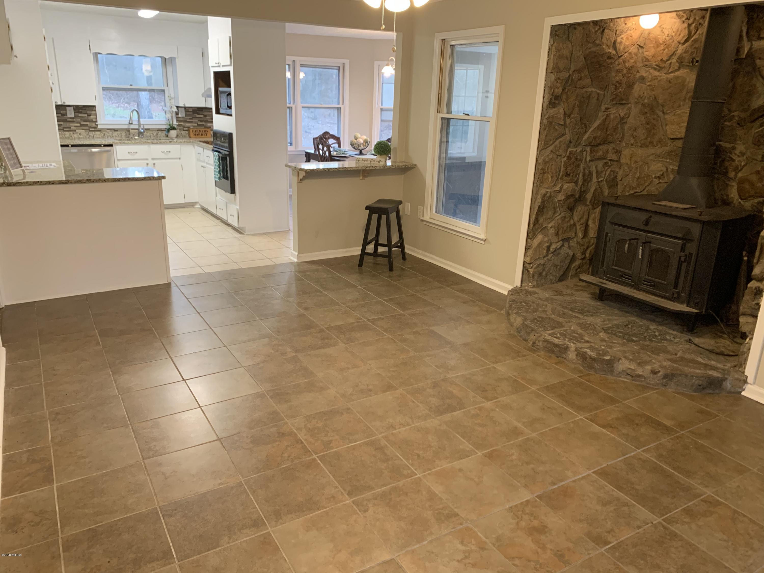 175 Red Oak Road Byron, GA 31008 - Photo 3 of 42 a view of a kitchen with cabinets and stainless steel appliances