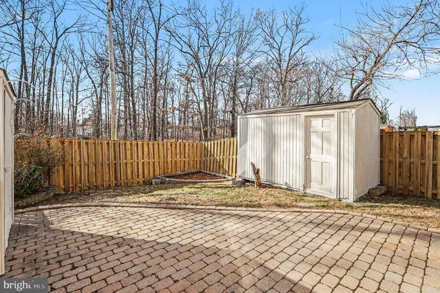 a view of a backyard of the house
