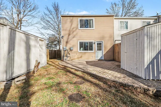 a view of a house with a snow on the road