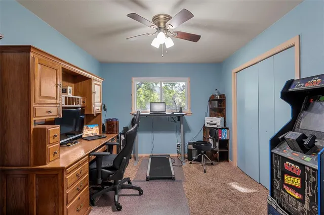 a room with furniture and a window