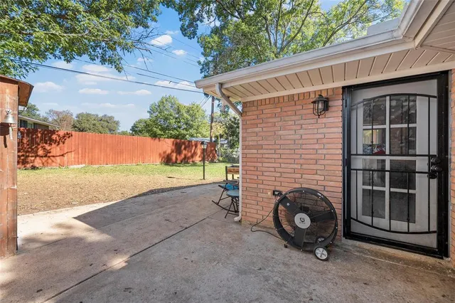 a view of backyard with outdoor space
