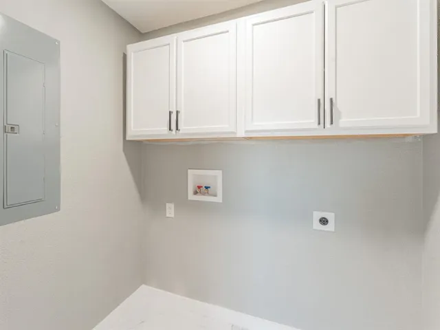 a white bath tub sitting in a bathroom