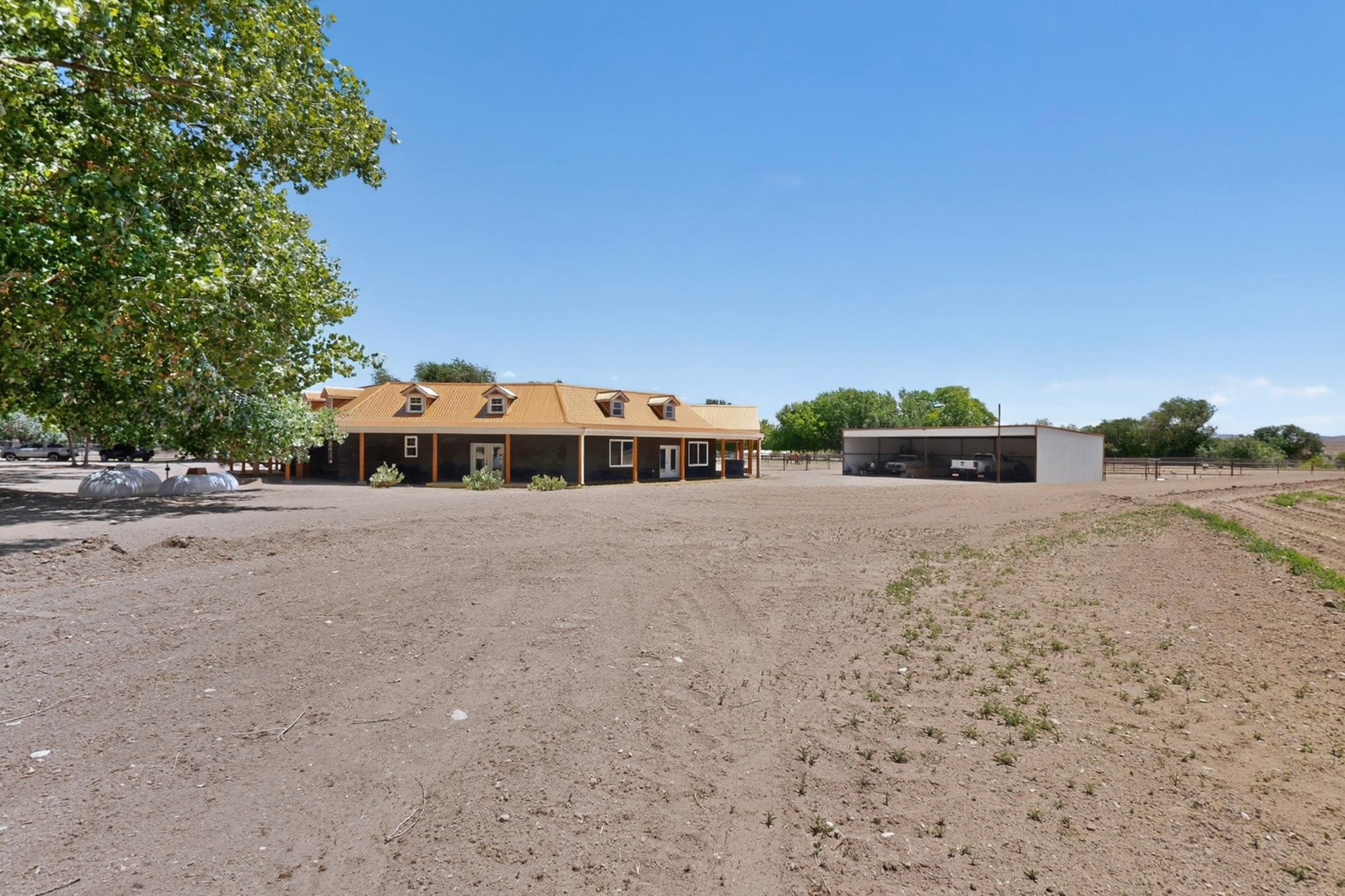 26 Schmittle Road Socorro, NM 87801 - Photo 4 of 80 Side and back view of the home near carport