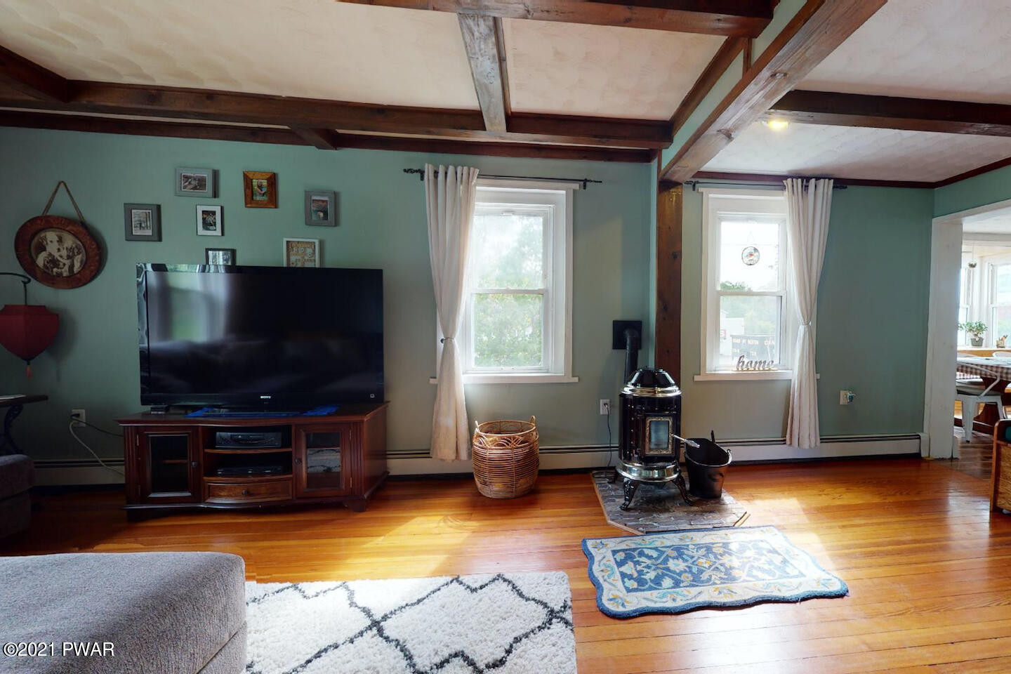 20 Pond Road Moscow, PA 18444 - Photo 29 of 59 a living room with furniture and a flat screen tv