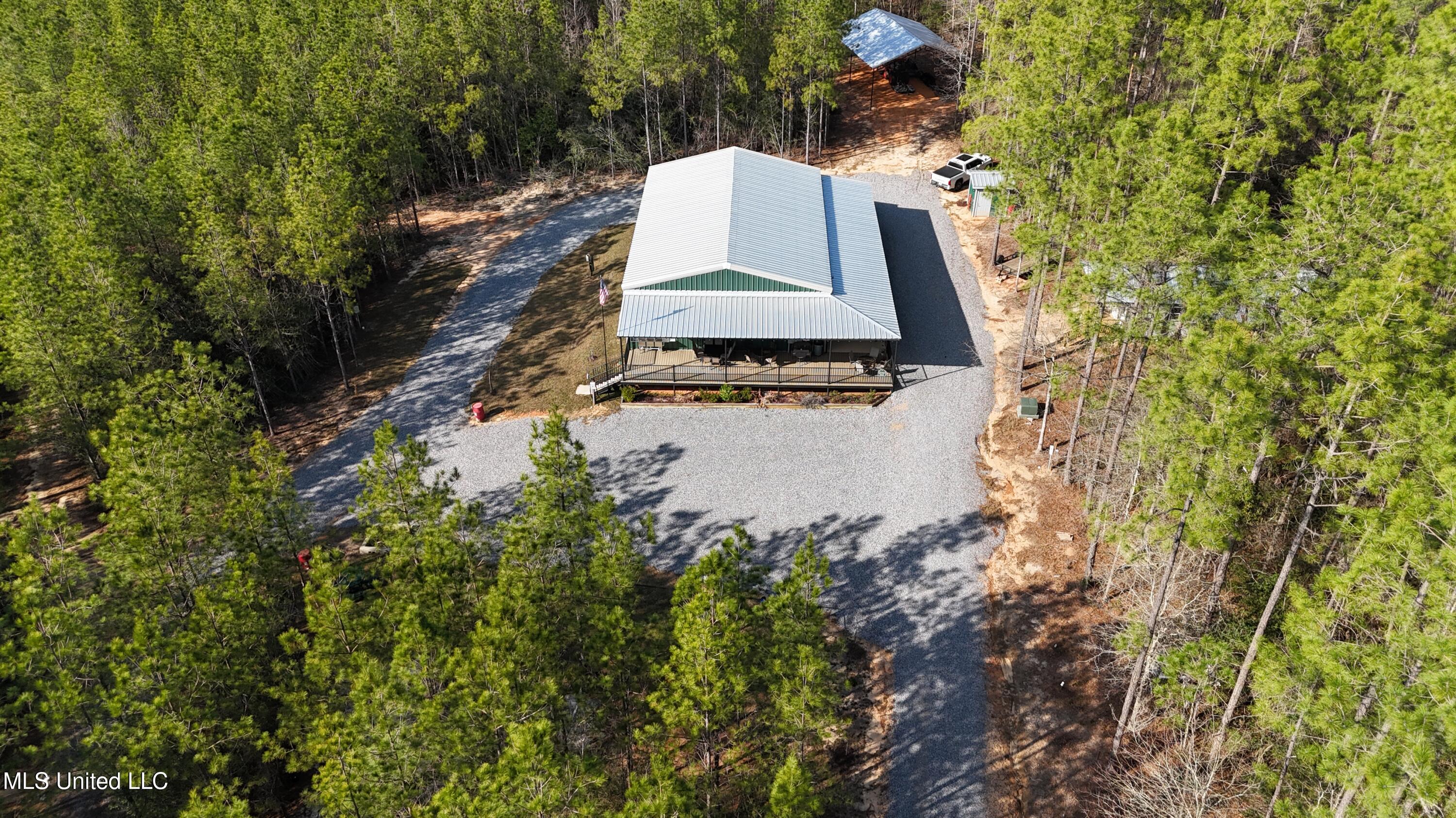 1773 Ridge Road, Unit B Perkinston, MS 39573 - Photo 21 of 33 DJI_20250209145306_0017_D