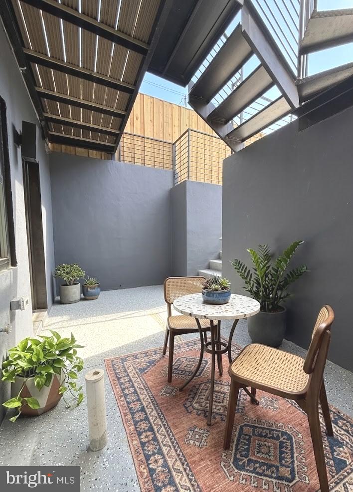 1218 5th Street Northeast, Unit A Washington, DC 20002 - Photo 16 of 25 Private patio off of primary bedroom