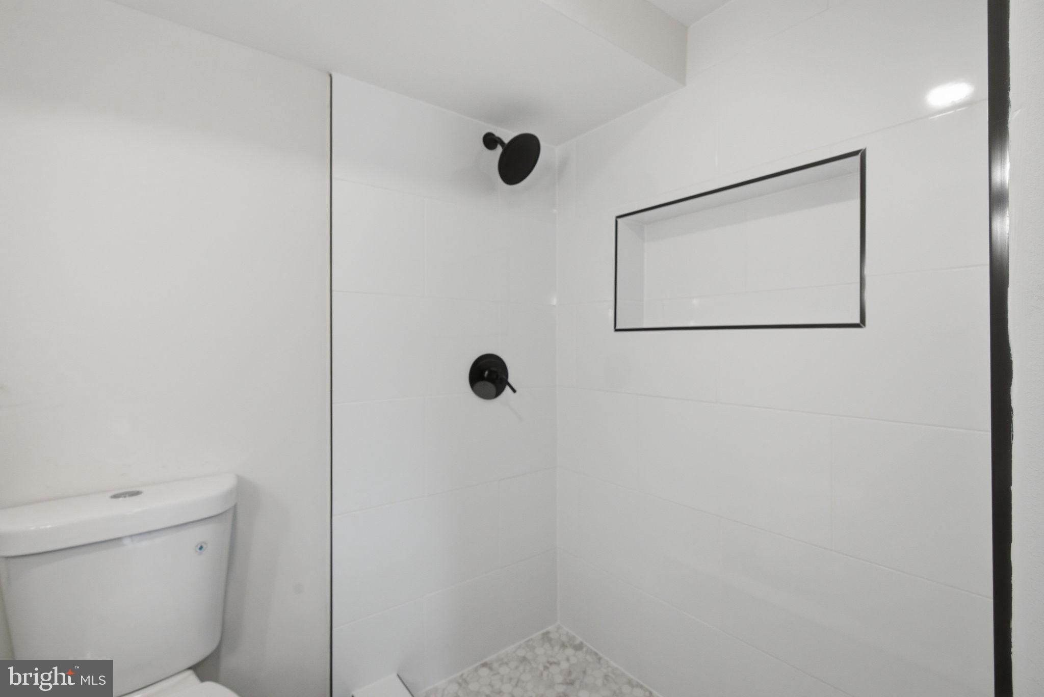 6615 Valley Park Road Capitol Heights, MD 20743 - Photo 23 of 25 Sleek, modern bathroom retreat.
