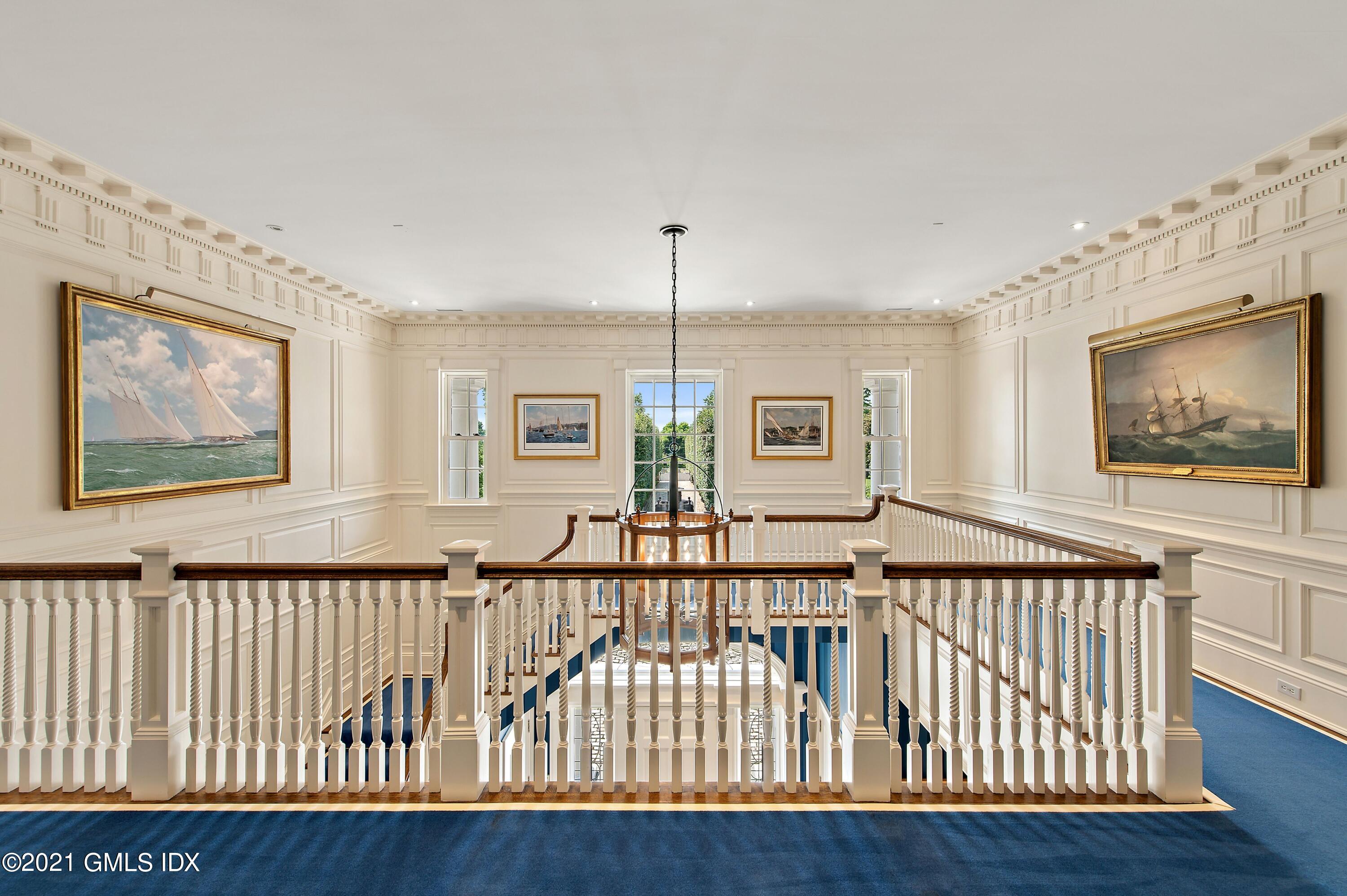 435 Round Hill Road Greenwich, CT 06831 - Photo 16 of 44 a view of a porch with wooden floor