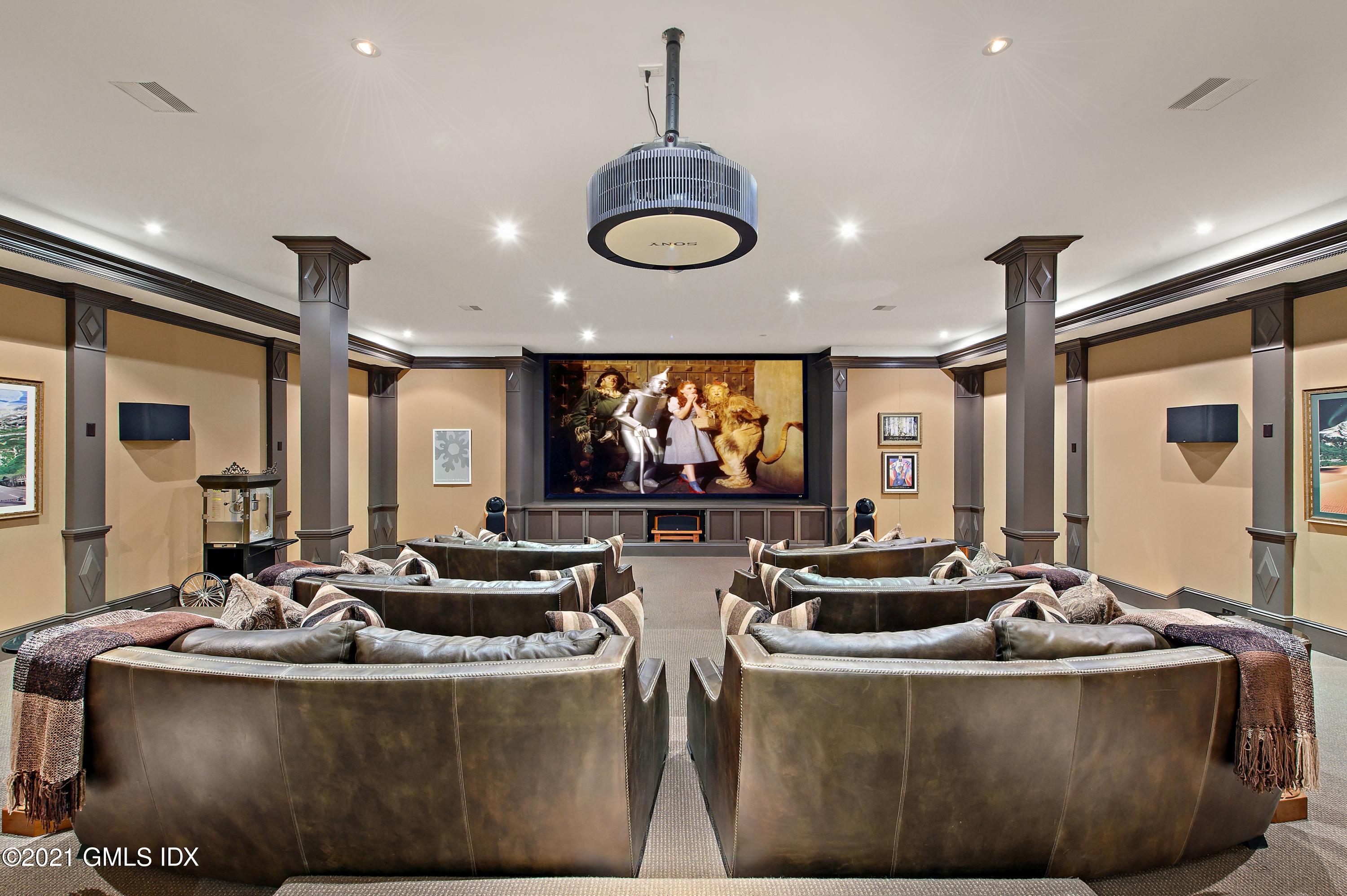 435 Round Hill Road Greenwich, CT 06831 - Photo 25 of 44 a living room with furniture and a large window