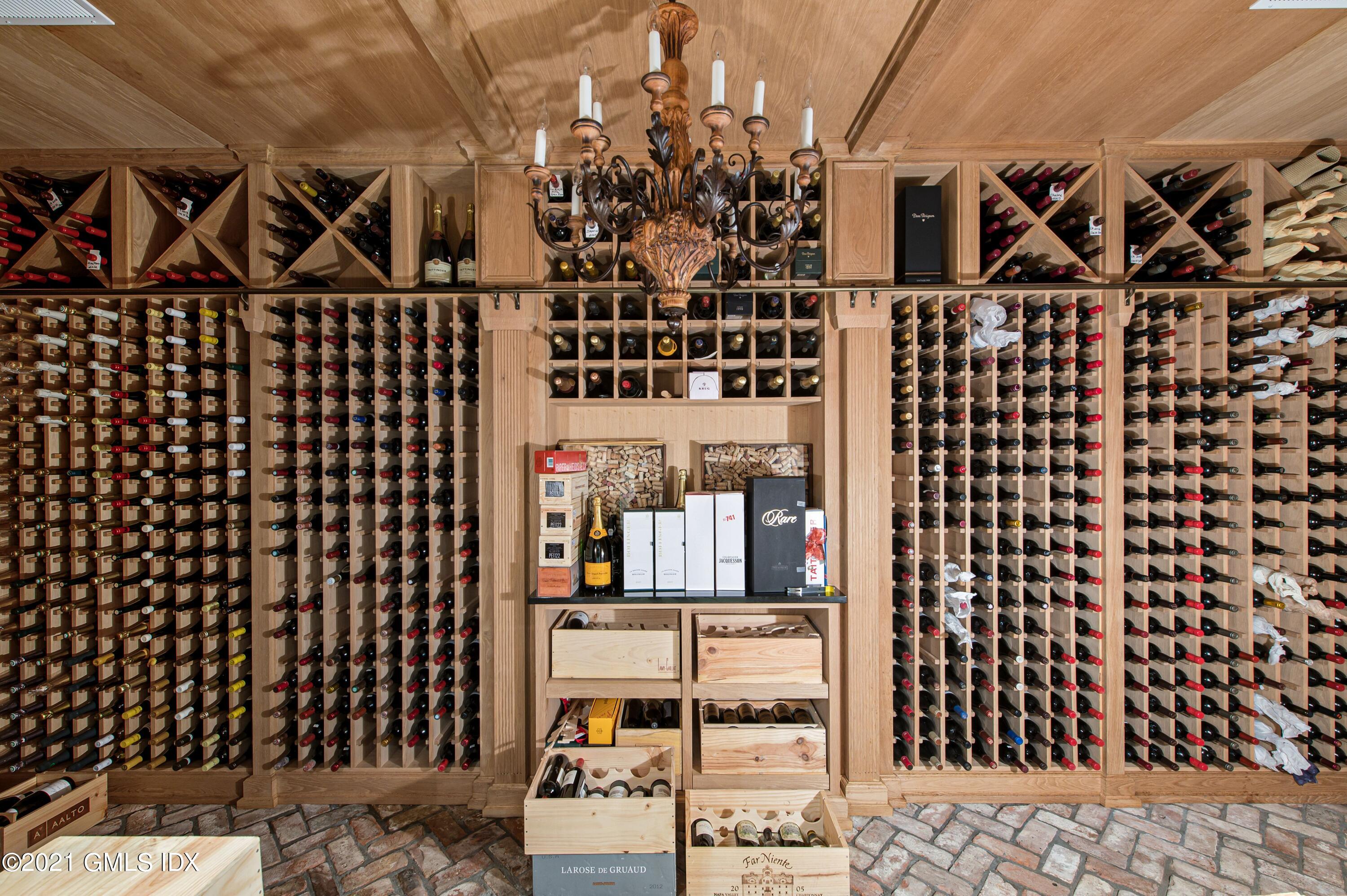 435 Round Hill Road Greenwich, CT 06831 - Photo 27 of 44 a view of a street with wooden wall