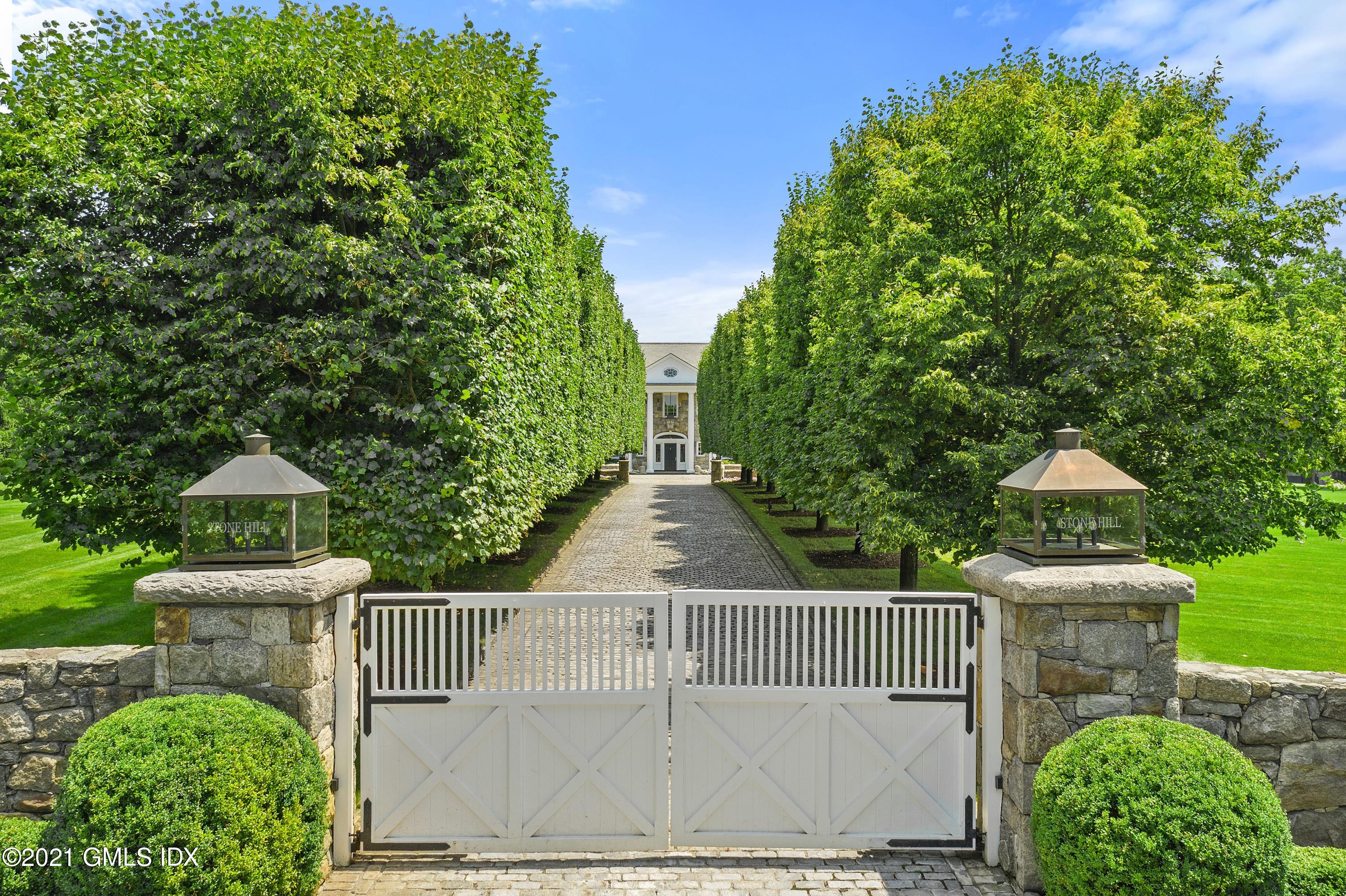 435 Round Hill Road Greenwich, CT 06831 - Photo 3 of 44 a view of a garden