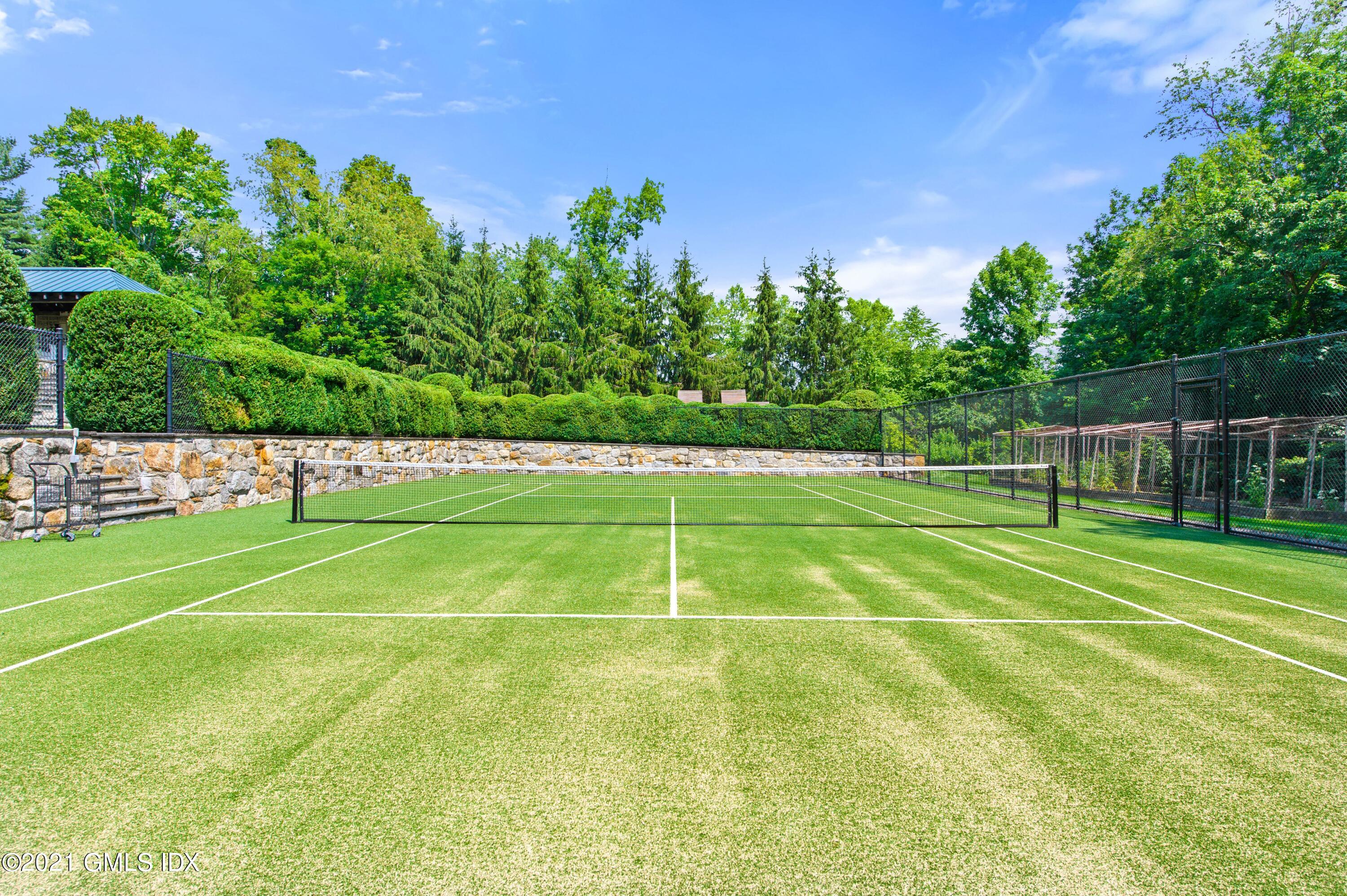 435 Round Hill Road Greenwich, CT 06831 - Photo 39 of 44 a view of a tennis court
