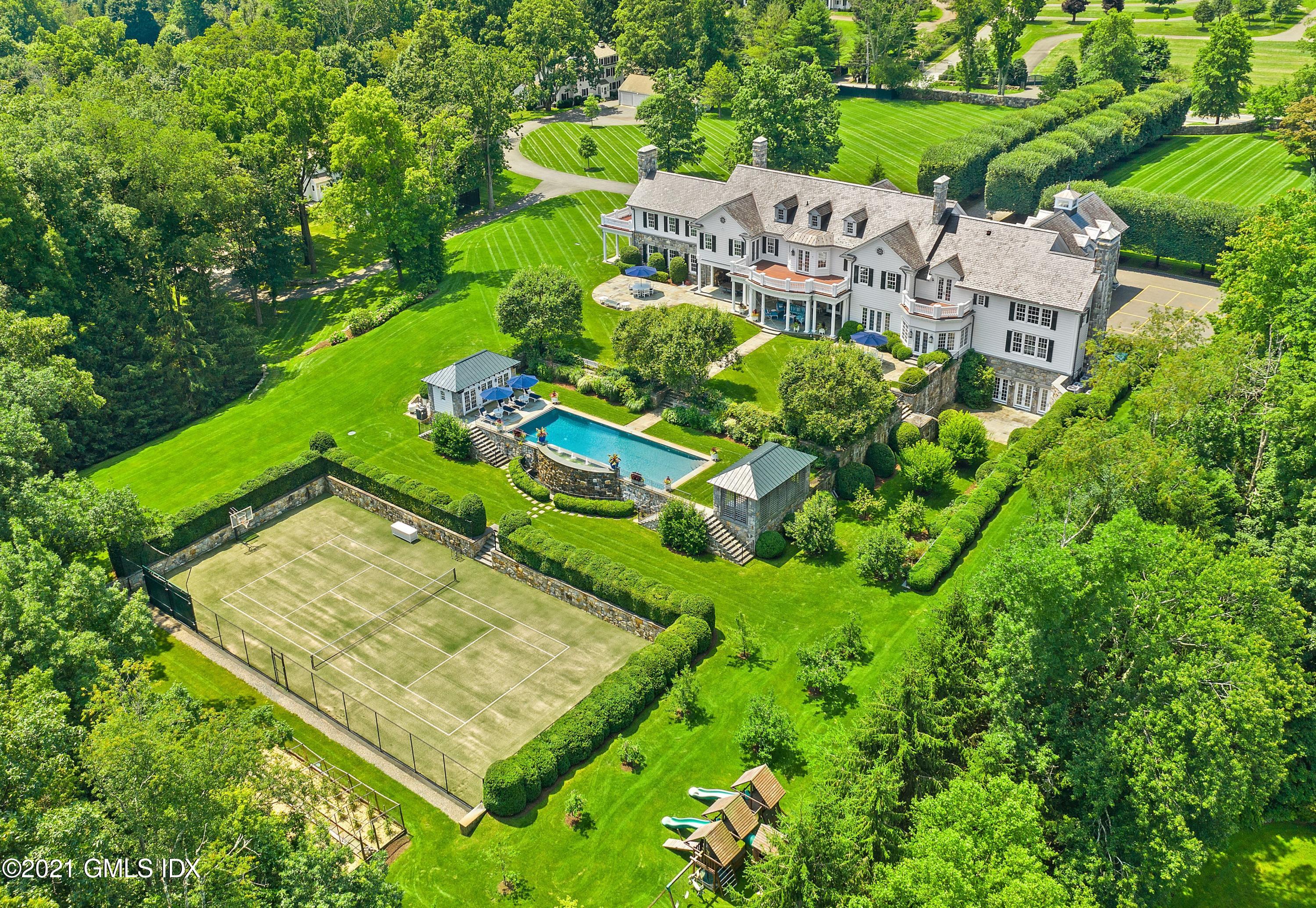 435 Round Hill Road Greenwich, CT 06831 - Photo 43 of 44 an aerial view of a house with a garden and yard