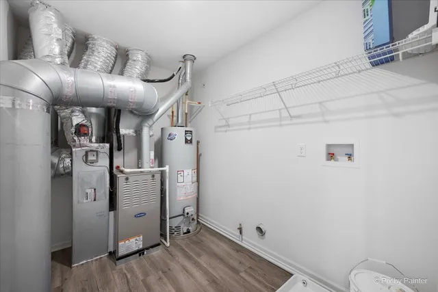 a view of a storage & utility room with closet area