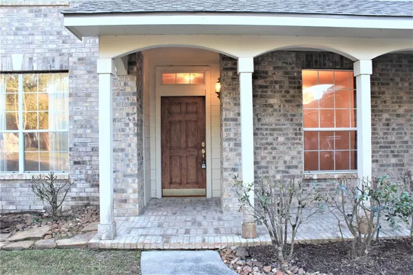 a front view of a house with a shower
