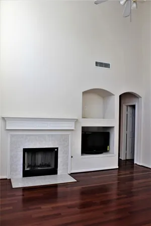 a living room with a fireplace