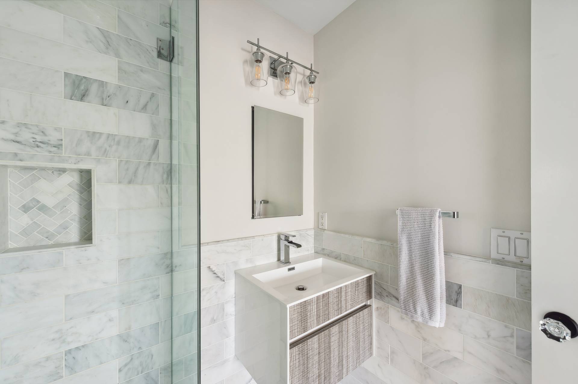 9 Central Avenue East Hampton, NY 11937 - Photo 12 of 21 a bathroom with a sink mirror and vanity