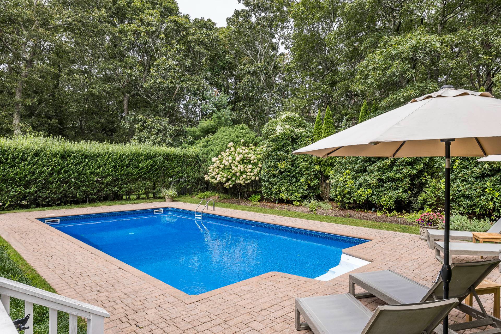 9 Central Avenue East Hampton, NY 11937 - Photo 18 of 21 a view of swimming pool with seating space