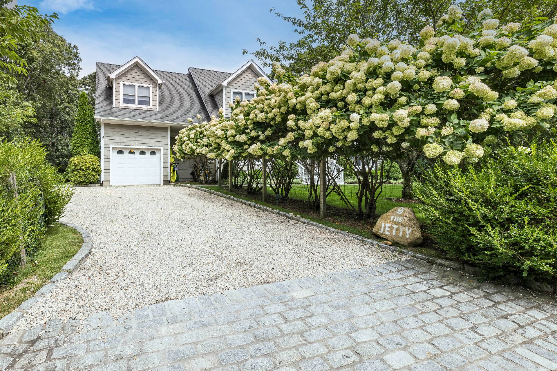 9 Central Avenue East Hampton, NY 11937 - Photo 21 of 21 a view of a house with a tree