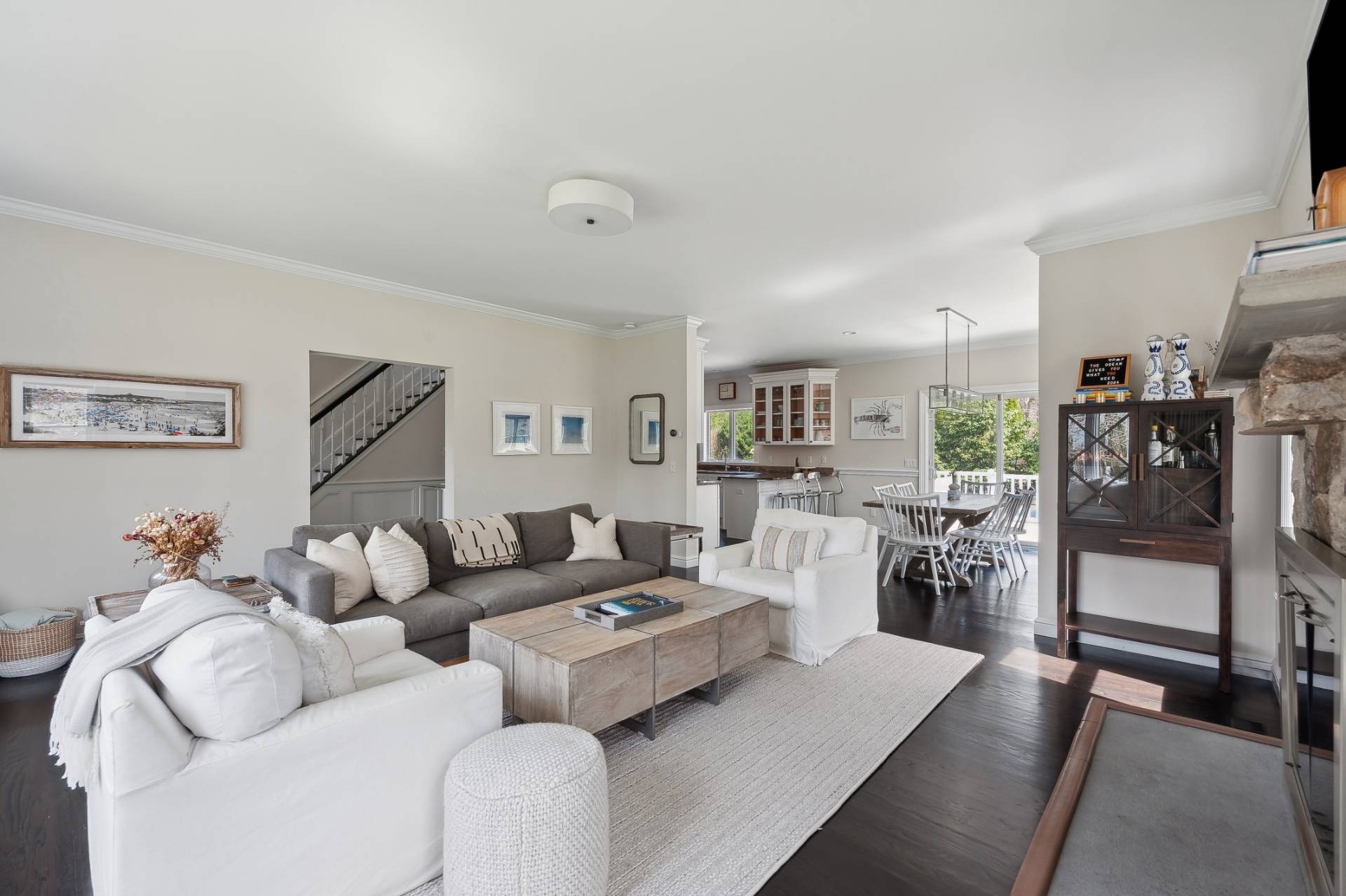 9 Central Avenue East Hampton, NY 11937 - Photo 4 of 21 a living room with furniture and a flat screen tv