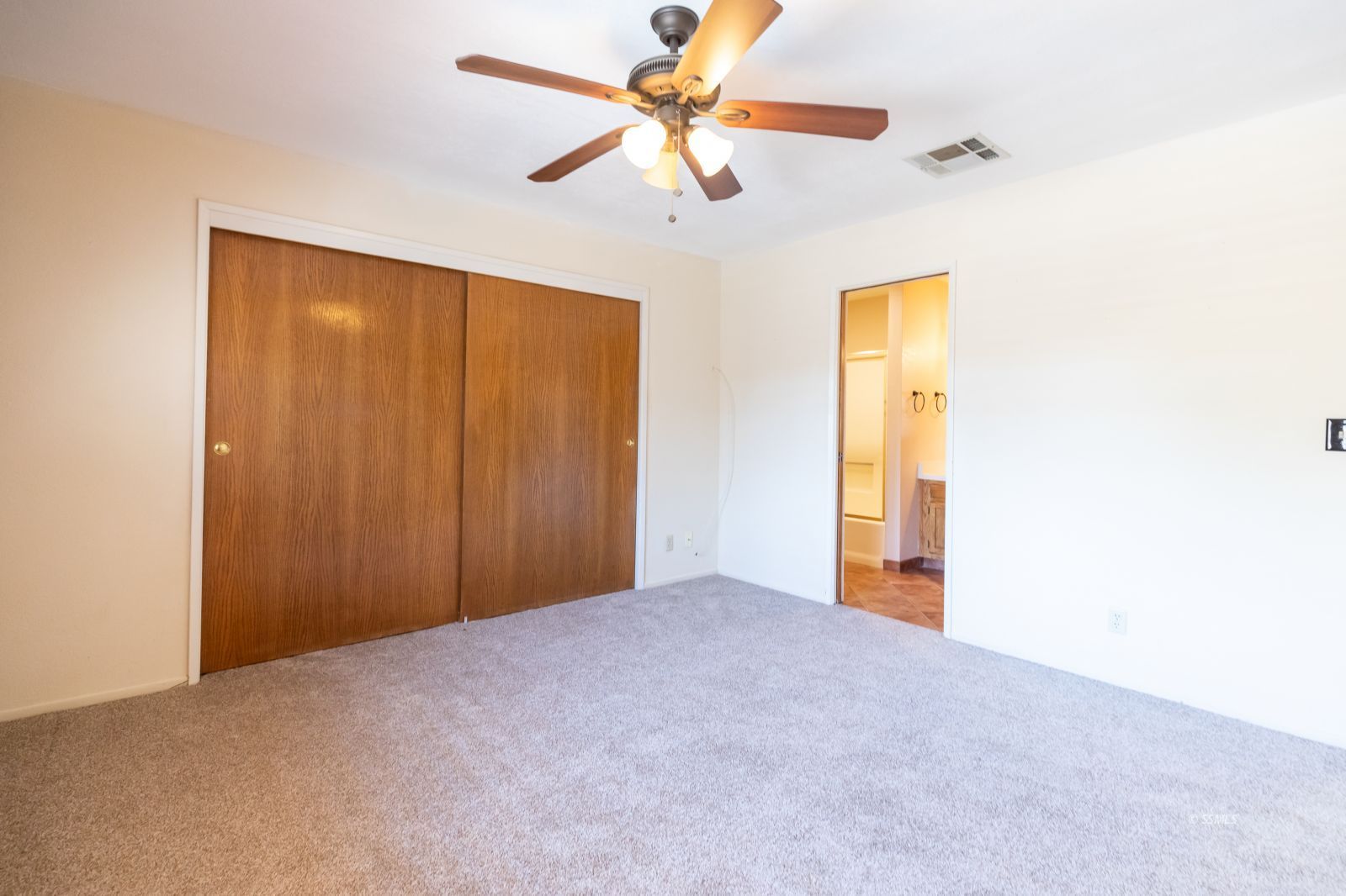 813 West Perdew Avenue Ridgecrest, CA 93555 - Photo 16 of 28 a view of a big room with a chandelier fan