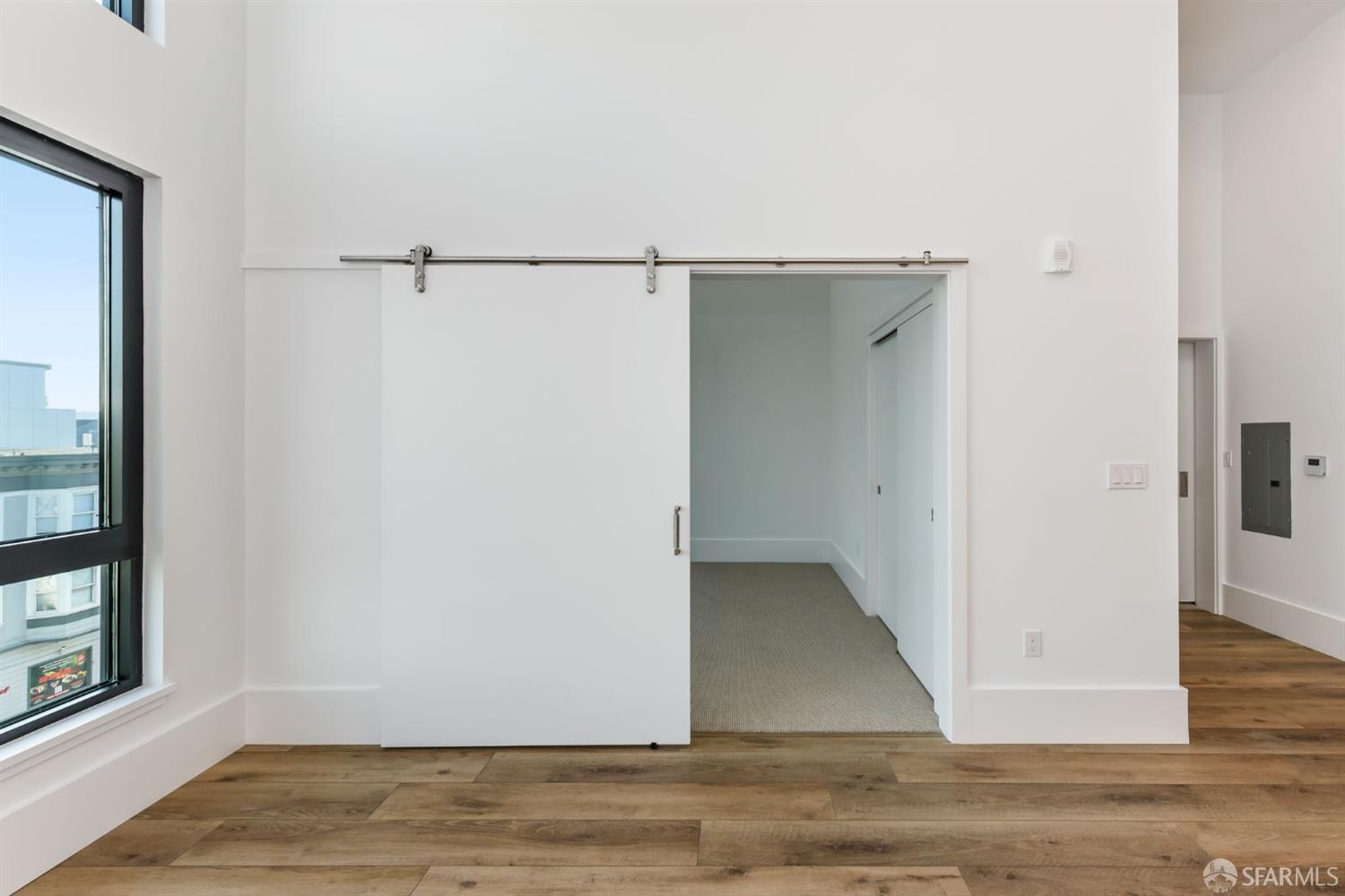1288 Howard Street, Unit 509 San Francisco, CA 94103 - Photo 11 of 55 a view of entryway with wooden floor