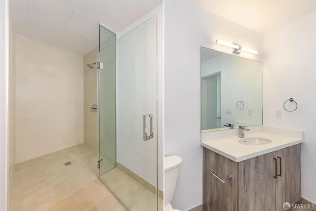 a bathroom with a sink a mirror and a shower