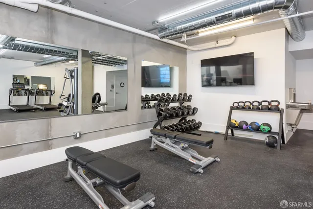 a view of a room with gym equipment