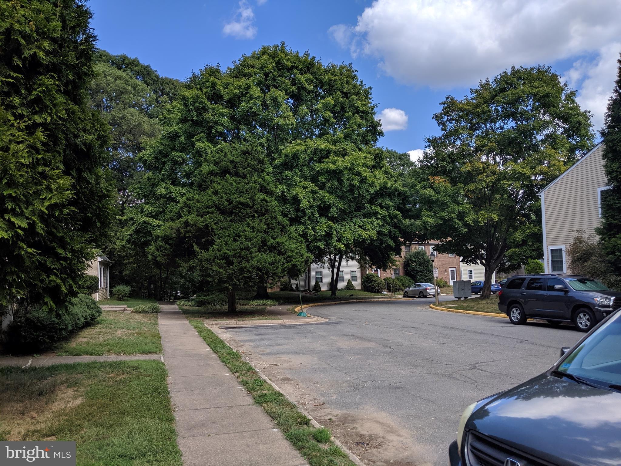 7760 Matisse Way Springfield, VA 22153 - Photo 21 of 21 a view of street with parked cars