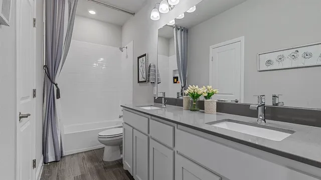 a bedroom with a bed and a stove