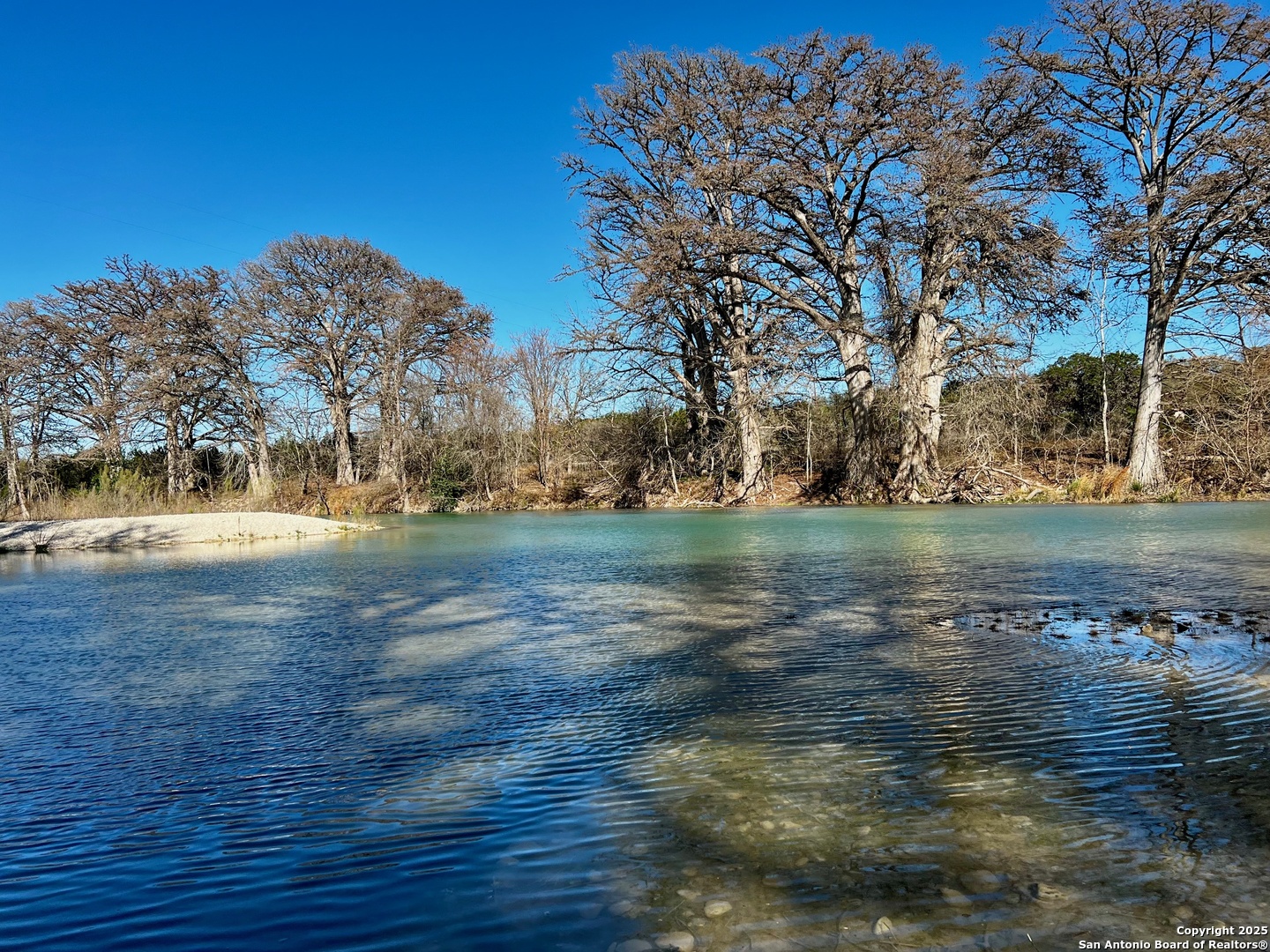 250 Redbud Road Concan, TX 78838 - Photo 5 of 10 a view of lake with outdoor space