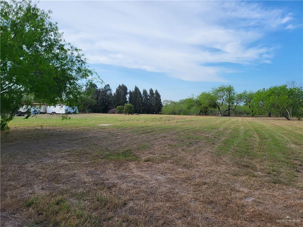 30504 Poco Parte Los Fresnos, TX 78566 - Photo 11 of 20 a view of a field with trees in background