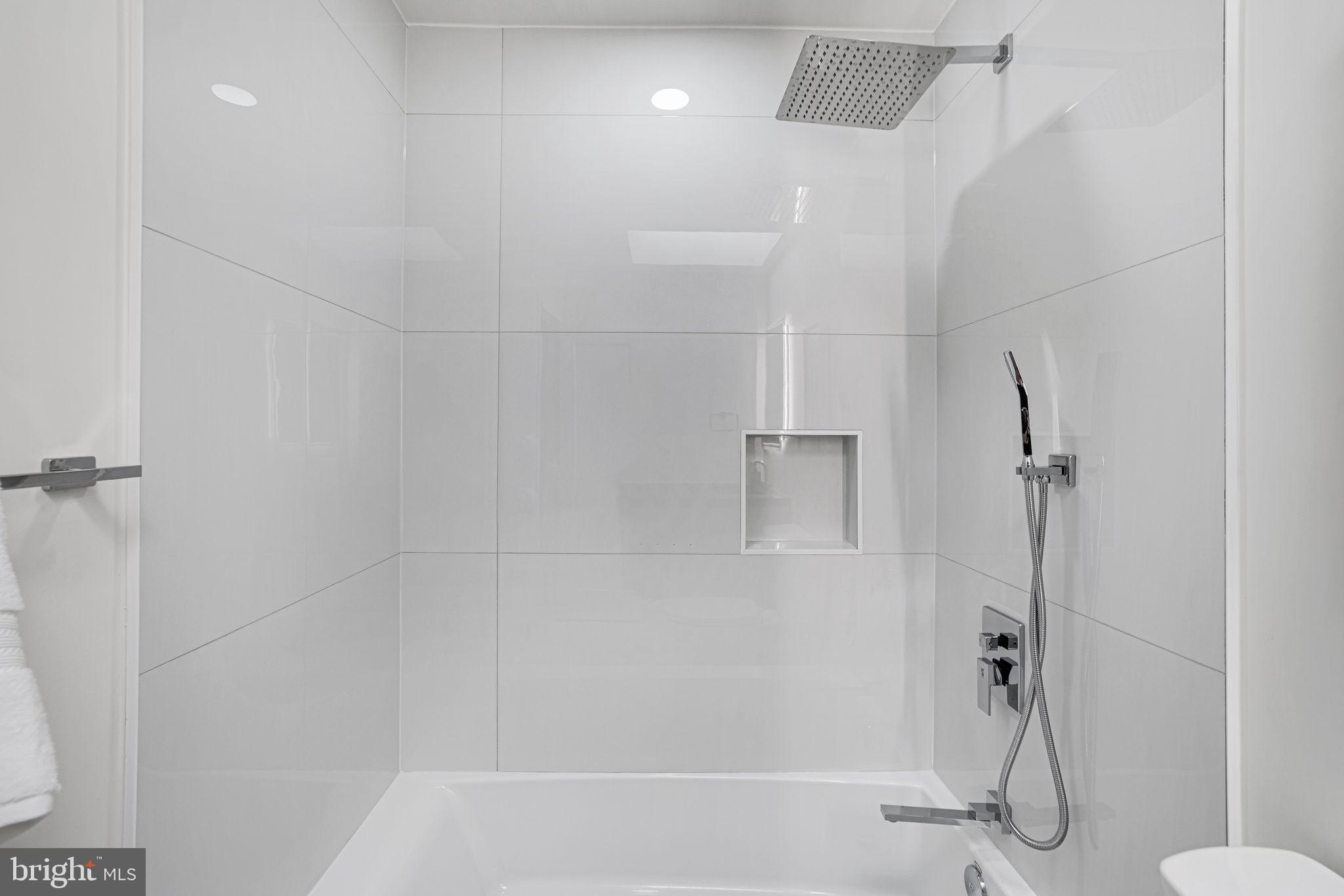 2220 13th Street Northeast Washington, DC 20018 - Photo 27 of 41 a bathroom with a shower