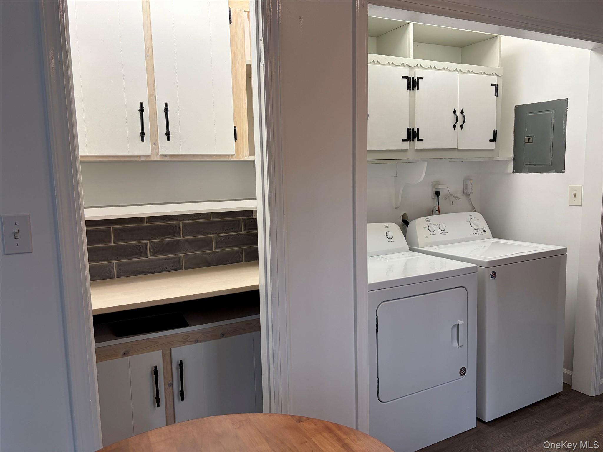 44 Gregory Road Glen Spey, NY 12737 - Photo 13 of 20 a view of cabinets and washer dryer