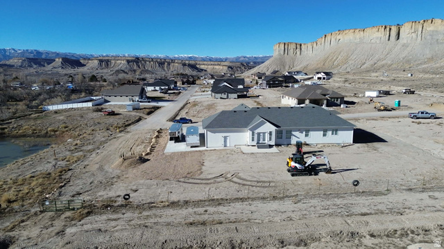 2350 North 1075 West Helper, UT 84526 - Photo 43 of 49 Aerial perspective of suburban area featuring a mountain backdrop