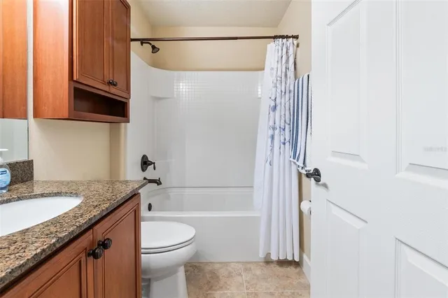 a view of a hallway with washer and dryer