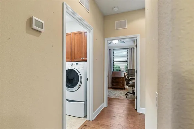 a utility room with dryer and washer