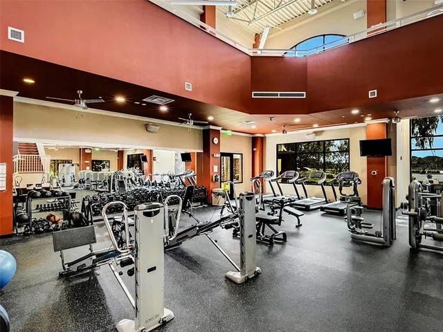 a view of a swimming pool with a outdoor seating