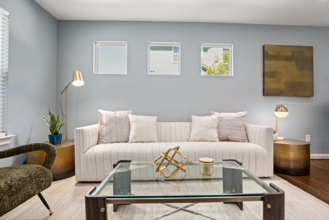 1183 Coleto Street Austin, TX 78702 - Photo 7 of 17 a living room with furniture and a couch