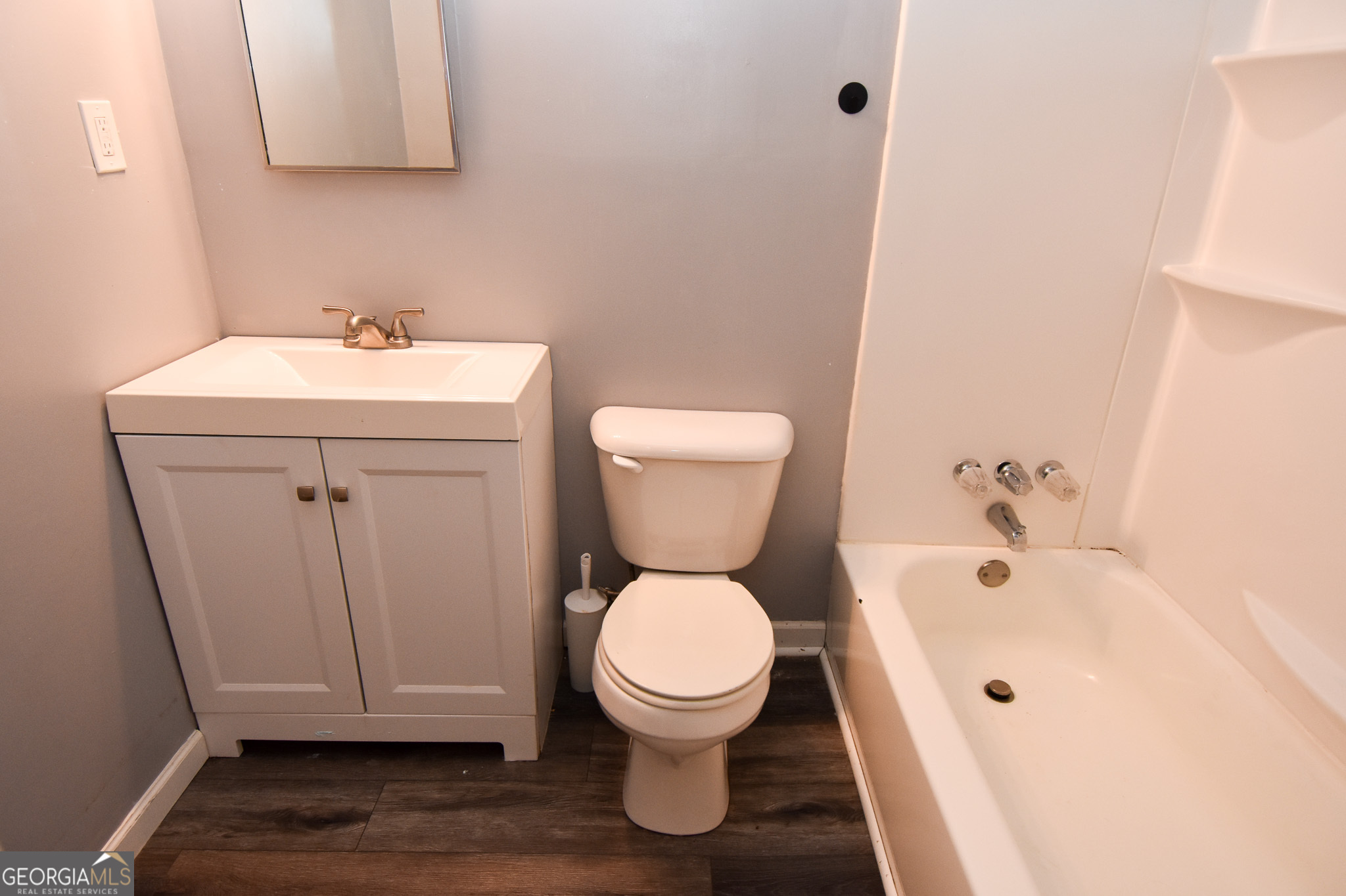 2250 Green Street Concord, GA 30206 - Photo 25 of 77 a bathroom with a sink and a toilet