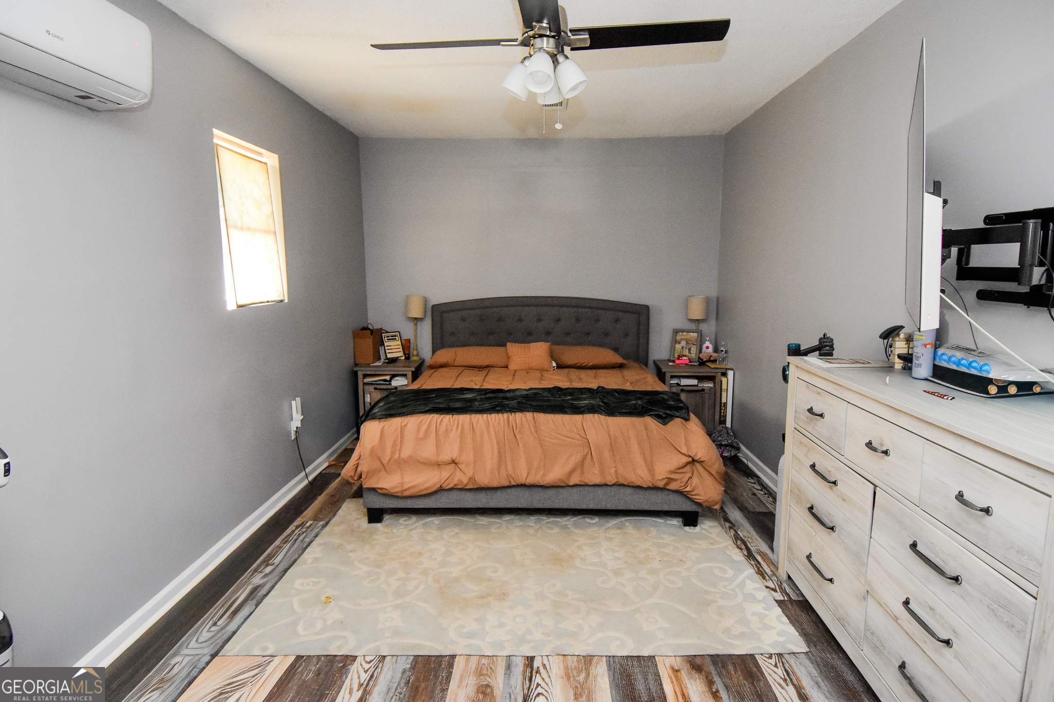 2250 Green Street Concord, GA 30206 - Photo 28 of 77 a bedroom with a bed and flat screen tv