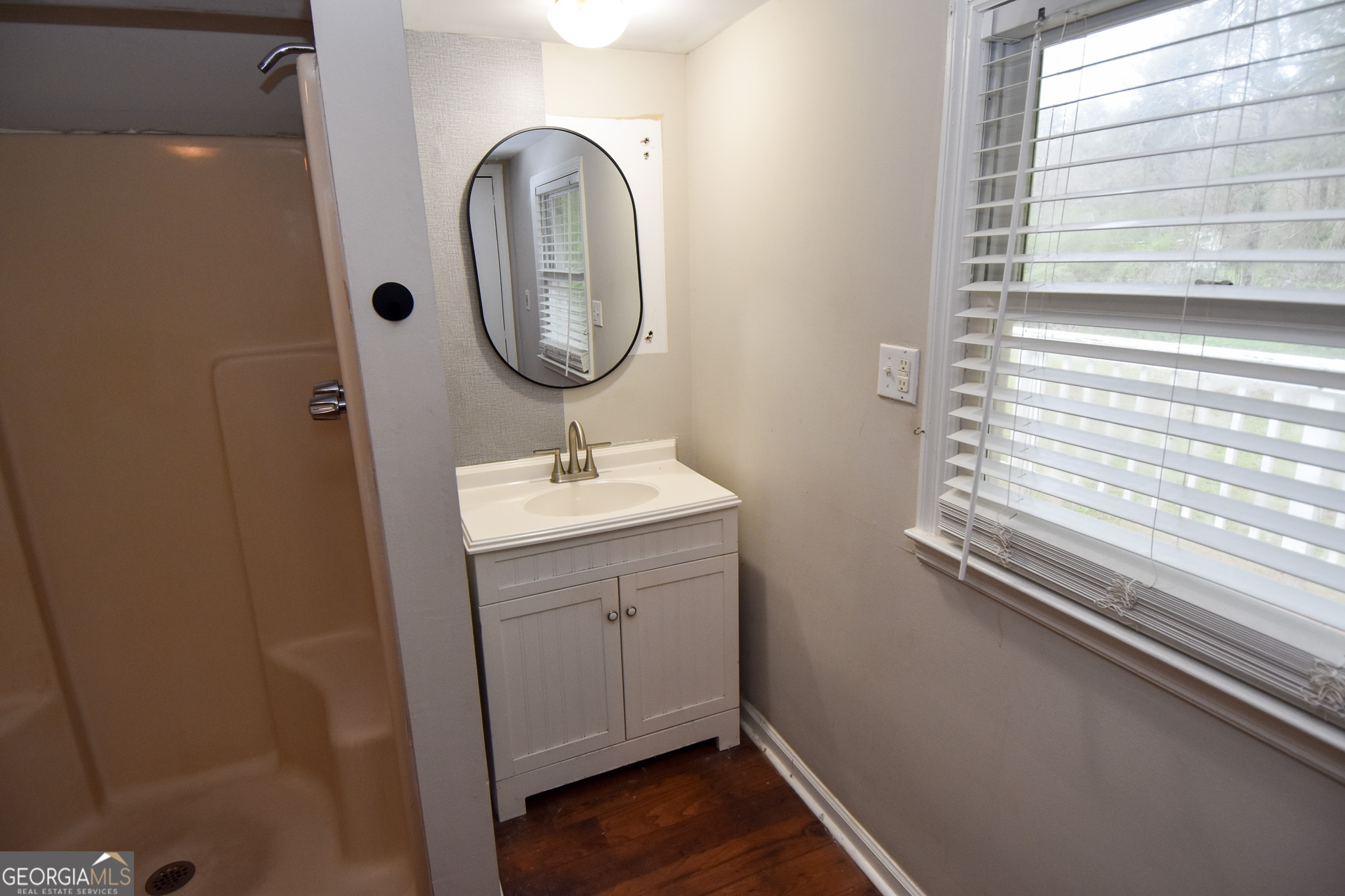 2250 Green Street Concord, GA 30206 - Photo 49 of 77 a bathroom with a sink and a mirror