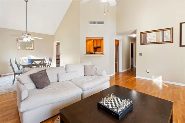 a living room with furniture and a rug