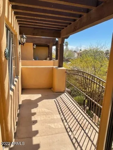a view of a house with a street