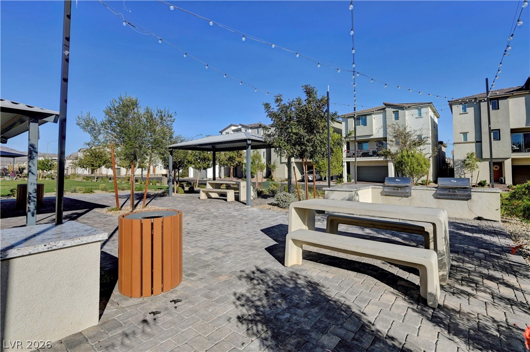 6924 Spicy Merlot Street North Las Vegas, NV 89086 - Photo 75 of 83 Enjoy al fresco dining with convenient built-in barbecues and ample covered seating areas.