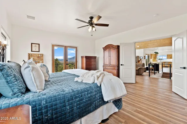 a bed room with bed and window