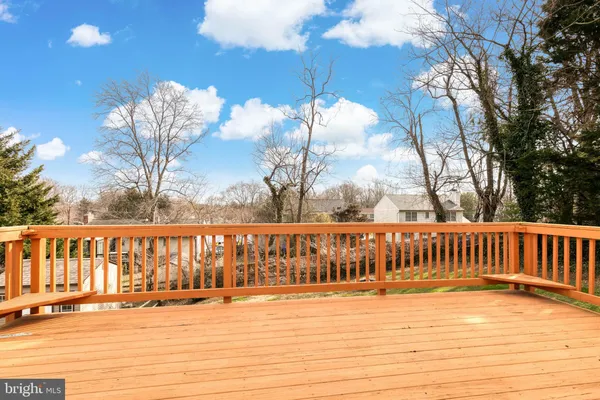 a view of balcony with wooden floor