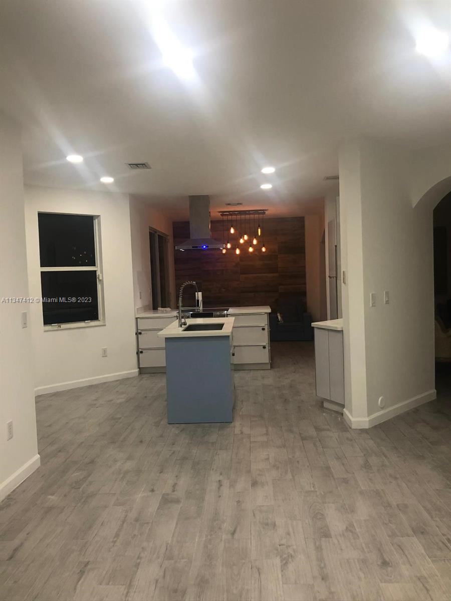 10836 Southwest 245th Street Homestead, FL 33032 - Photo 11 of 18 a view of a room with gym equipment