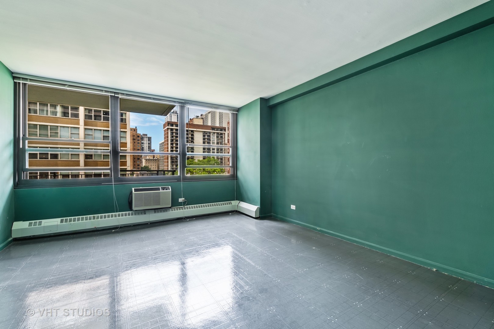 33 East Cedar Street, Unit 8H Chicago, IL 60611 - Photo 10 of 15 a view of an empty room with a window