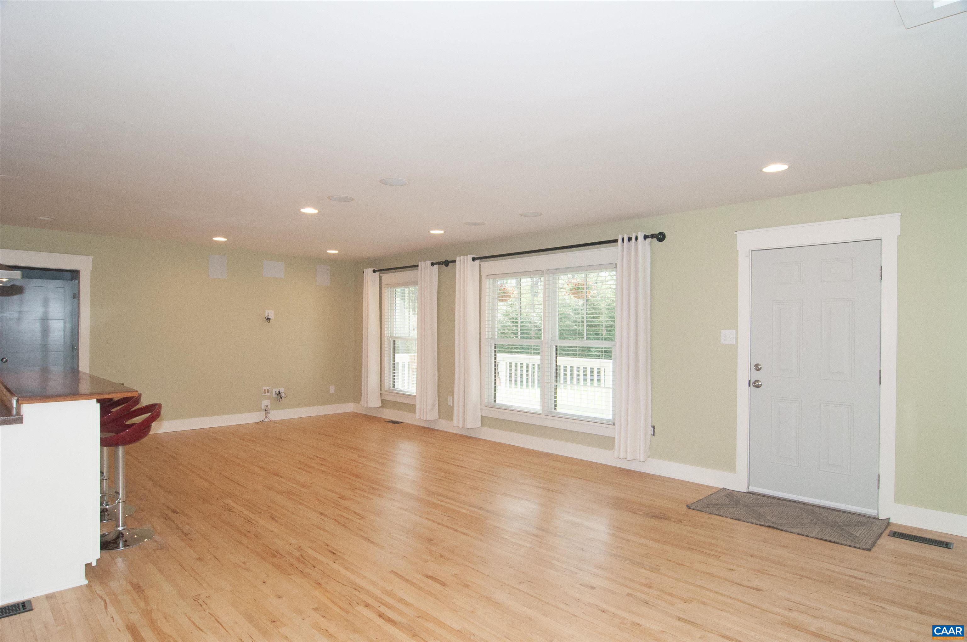 4600 Advance Mills Road Earlysville, VA 22936 - Photo 15 of 61 a view of an empty room with wooden floor and a window